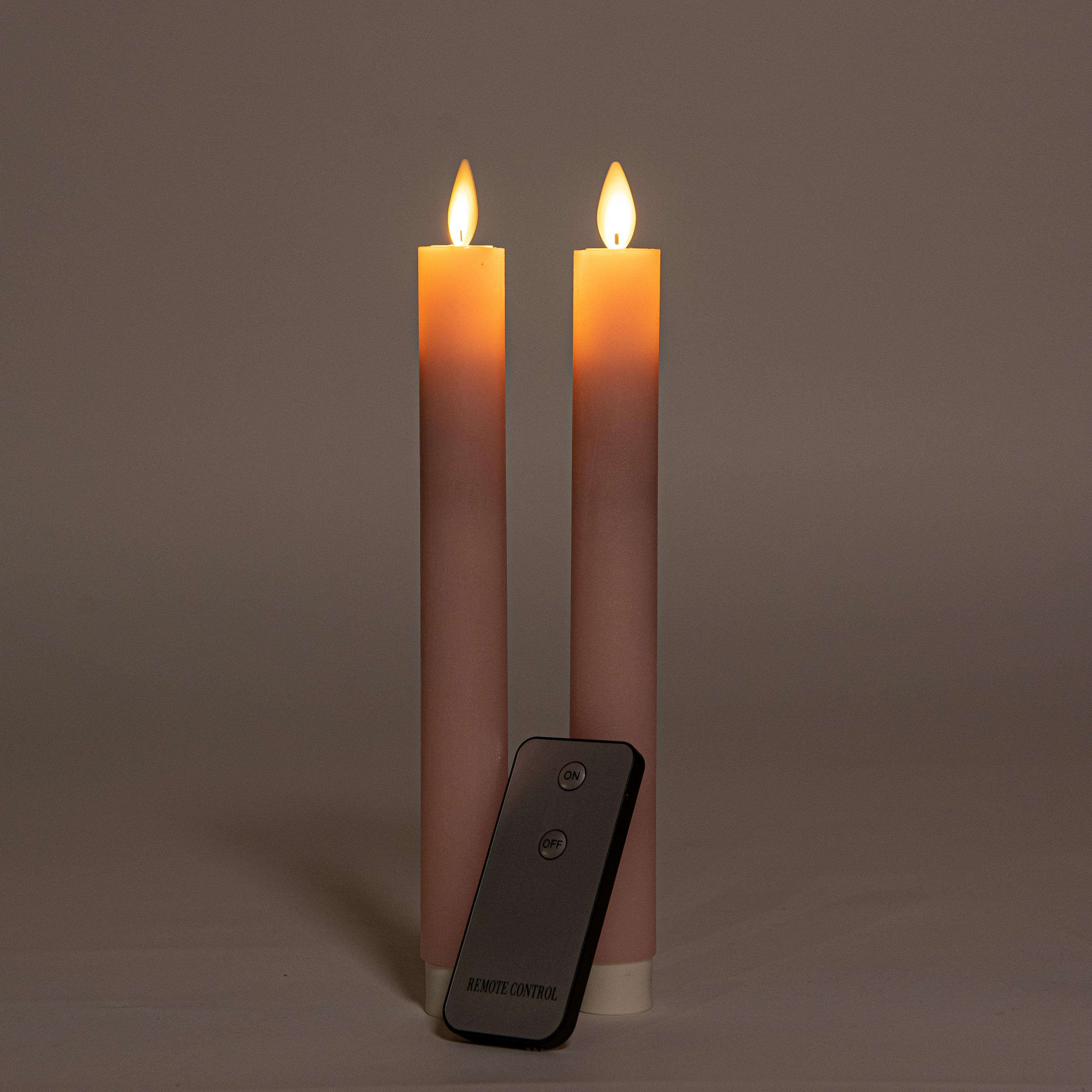 Kaarsen set van 2x stuks Led dinerkaarsen lichtroze inclusief afstandsbediening 23 cm -
