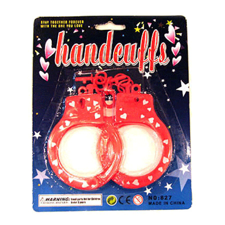 Erotic set eyemask and red handcuffs